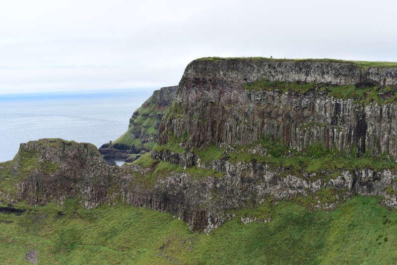 Away a wee walk - small people on a big cliff