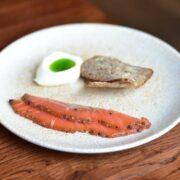 peppered trout, Katy rodgers crème fraîche and rye bread.