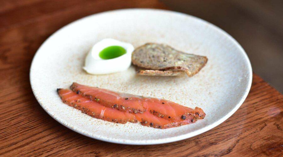 peppered trout, Katy rodgers crème fraîche and rye bread.